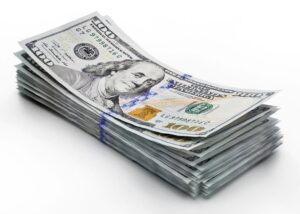 billetes de dolares estadounidenses apilados