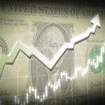 billetes-de-dolares-y-graficos-financieros