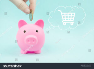 mano guardando dinero en alcancia digital